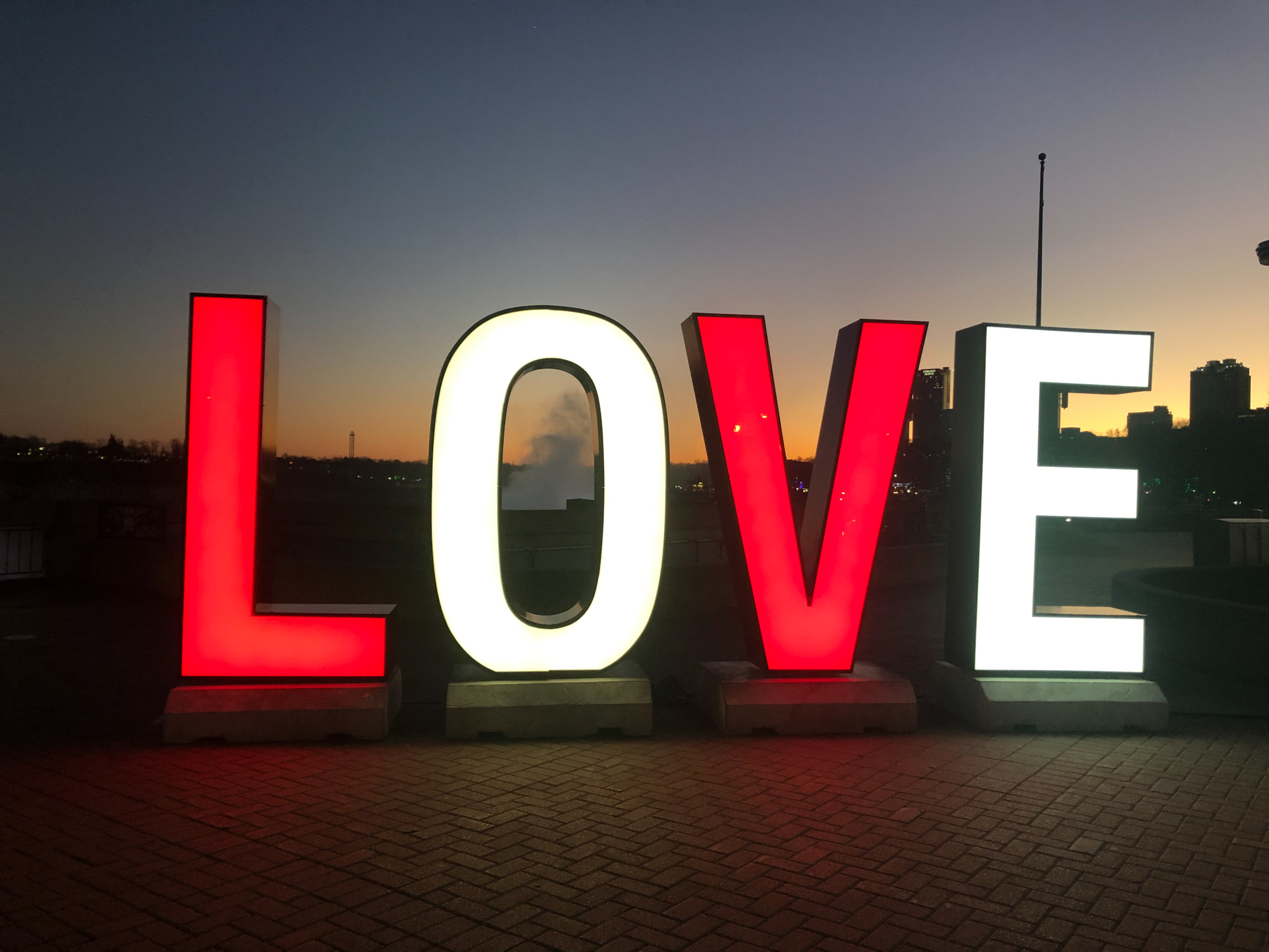 A couple taking a photo of their food at Table Rock House Restaurant